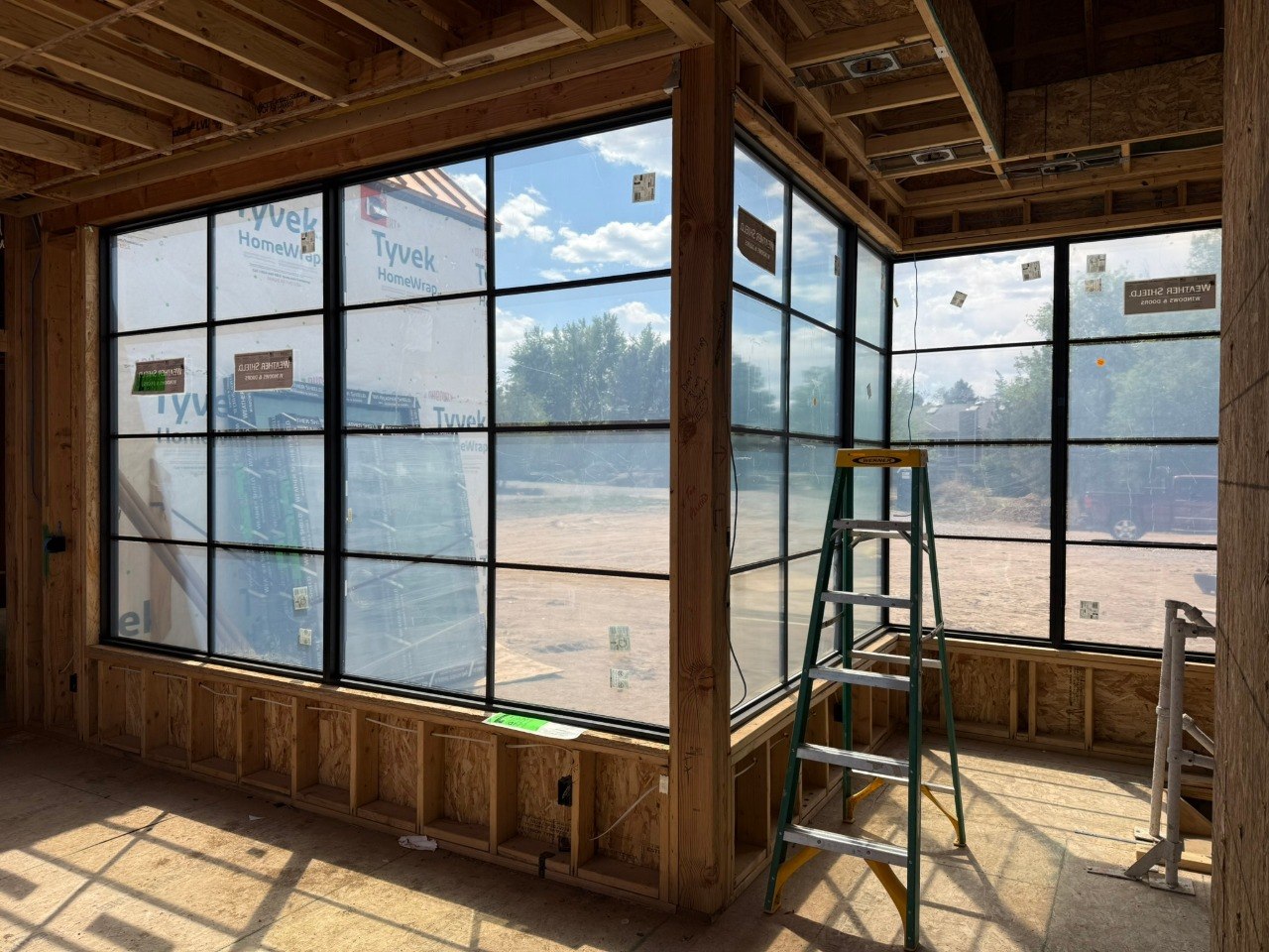 Interior window wall installation in progress